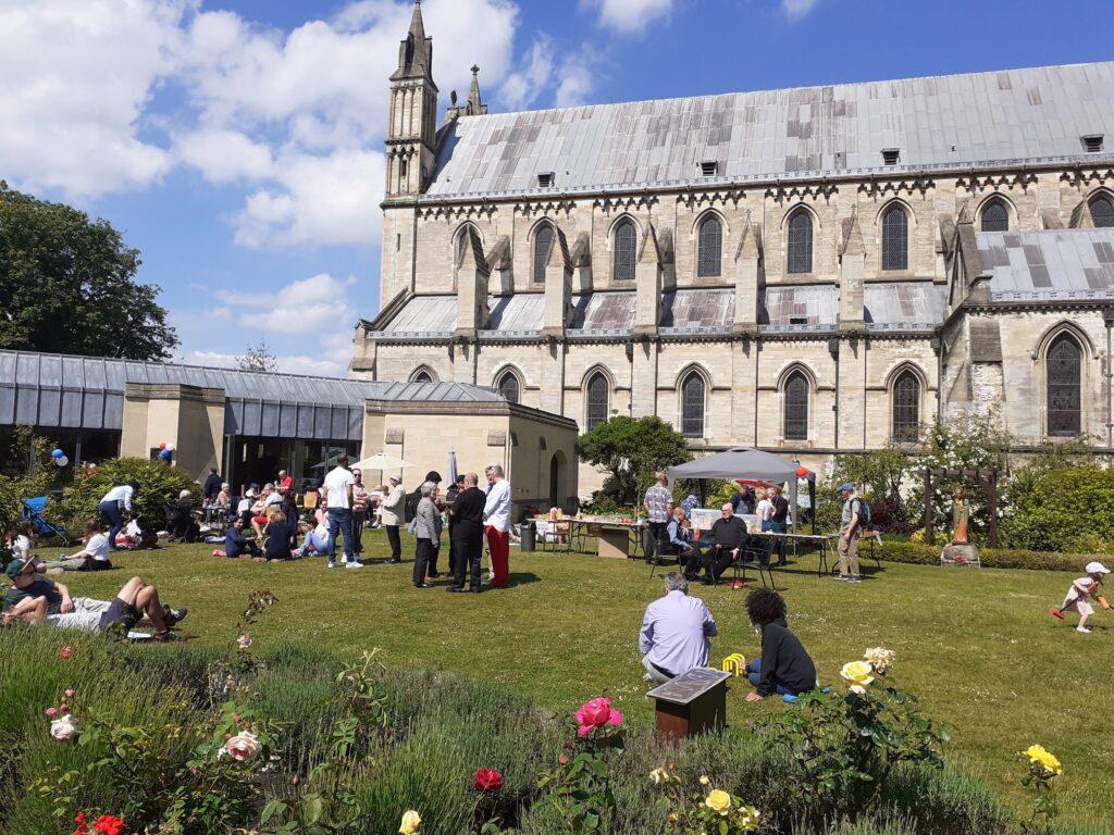 People in beautiful gardens at St John the Baptist Cathedral