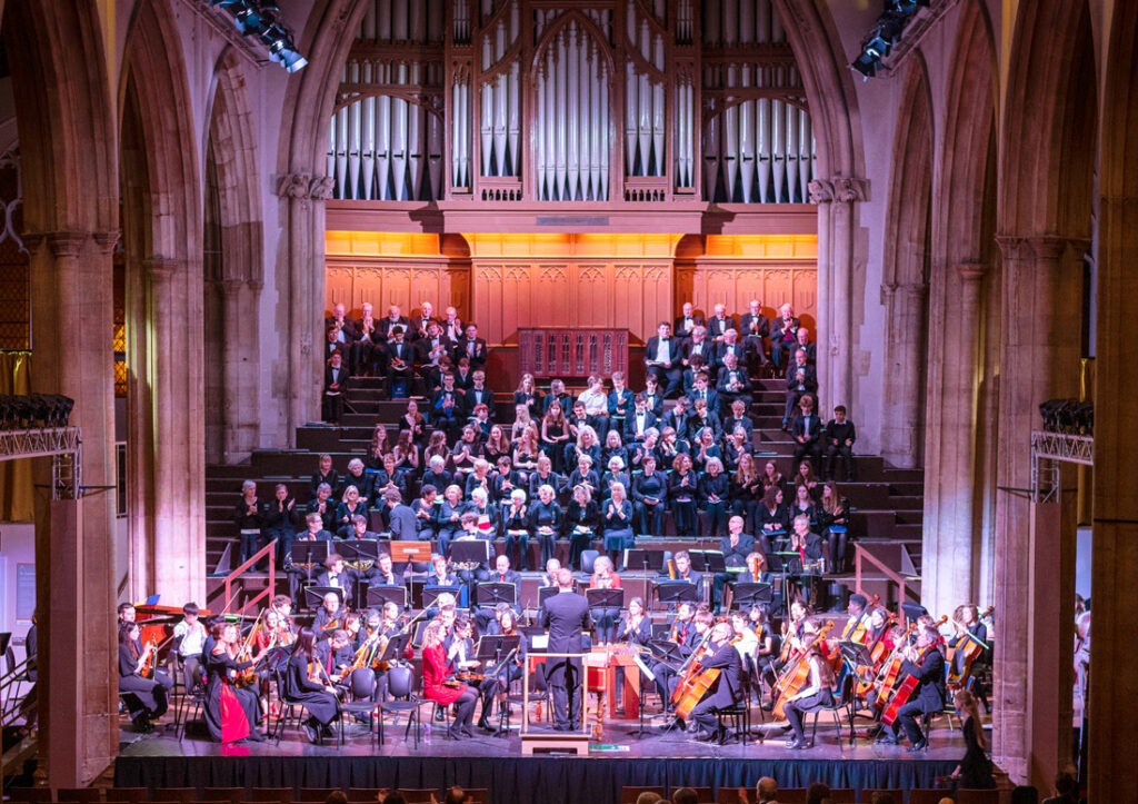 Choral group and band in St John the Baptist Cathedral with beautiful lighting