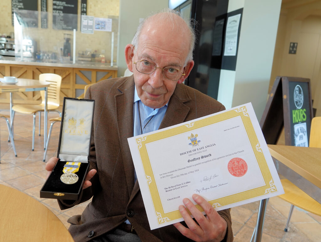 Man with certificate of service