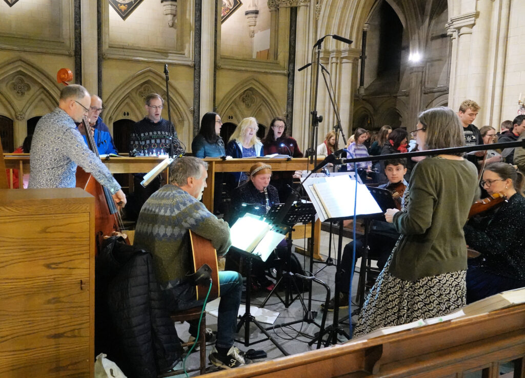 Group singing and playing instruments.