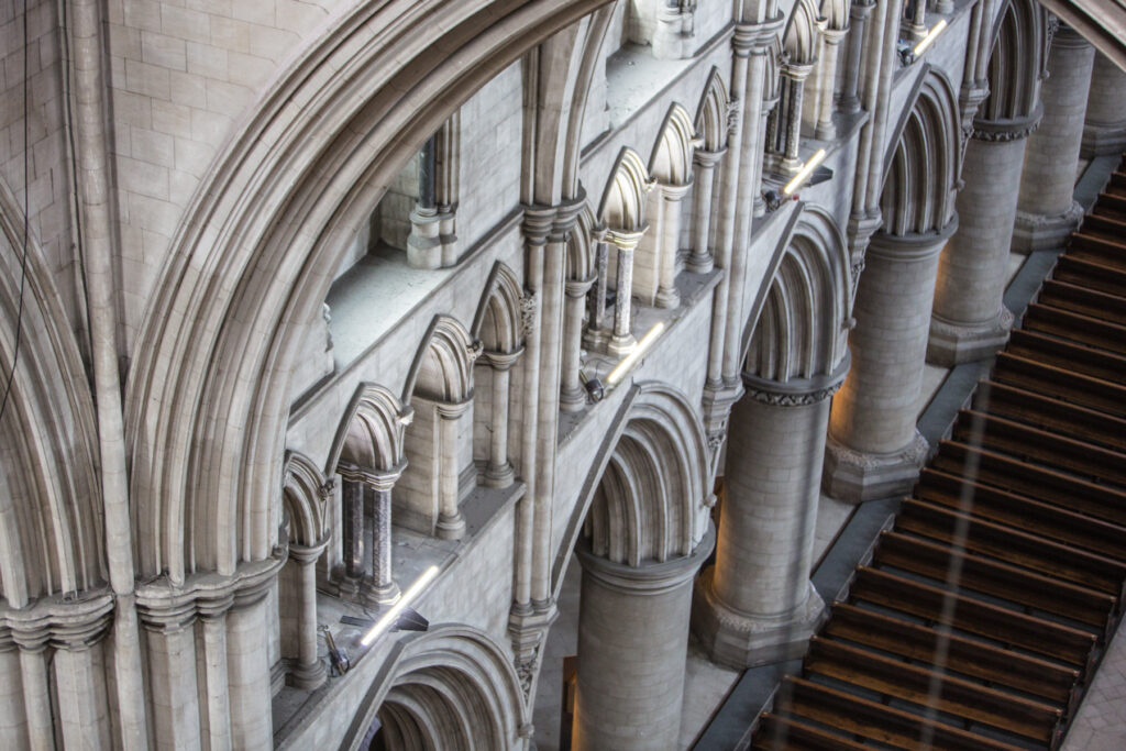 Interior view of stone arches of St John The Baptist Cathedral from above.