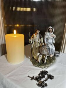 Posada and candle